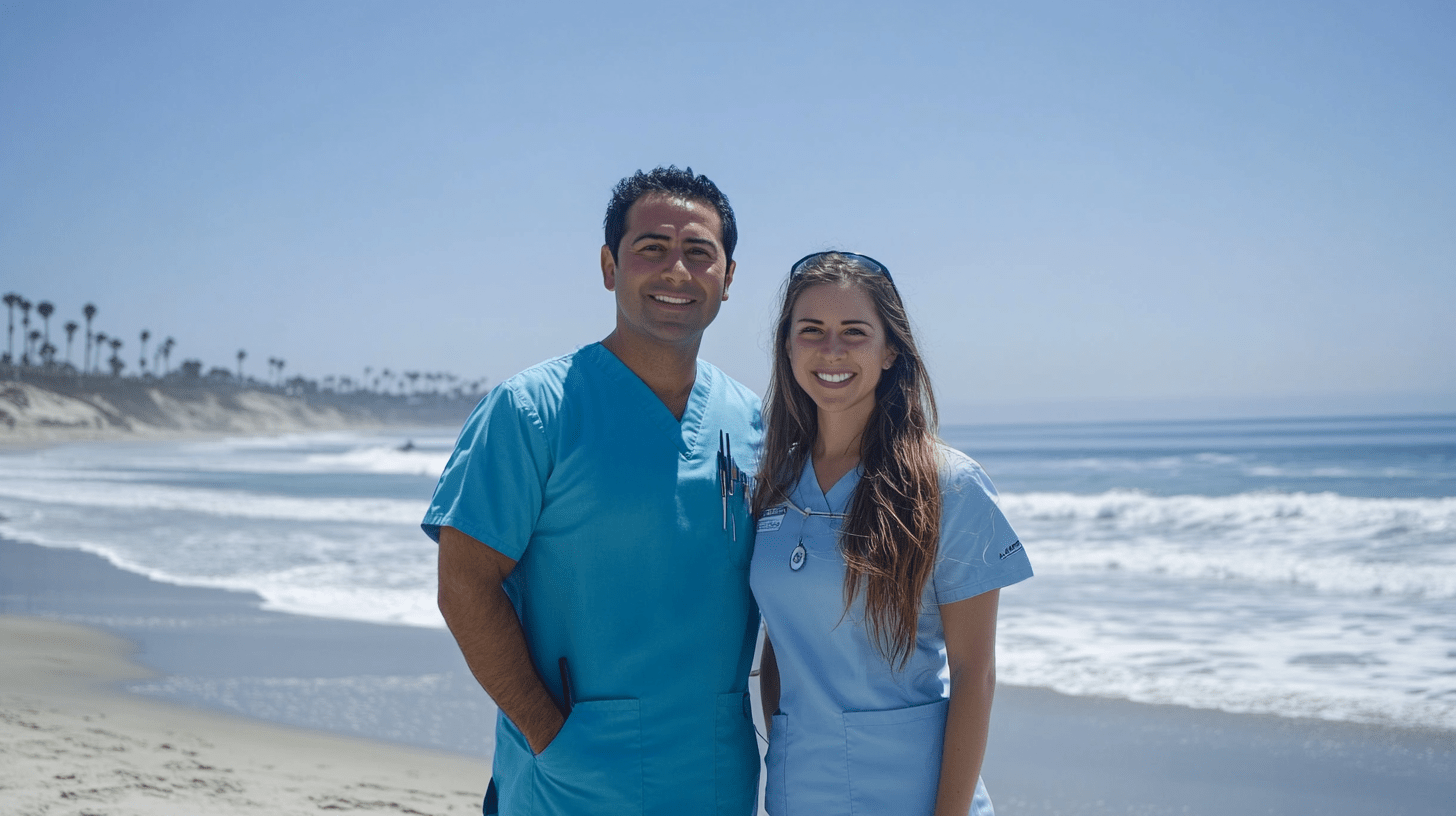 Two dentists standing on the beach at Imperial Beach, California.