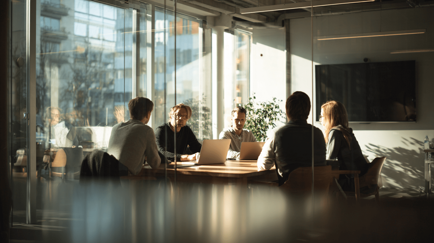 A team of accountants in a meeting room discussing their SEO.